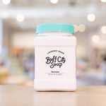 clear container of Narcissist Laundry Soap