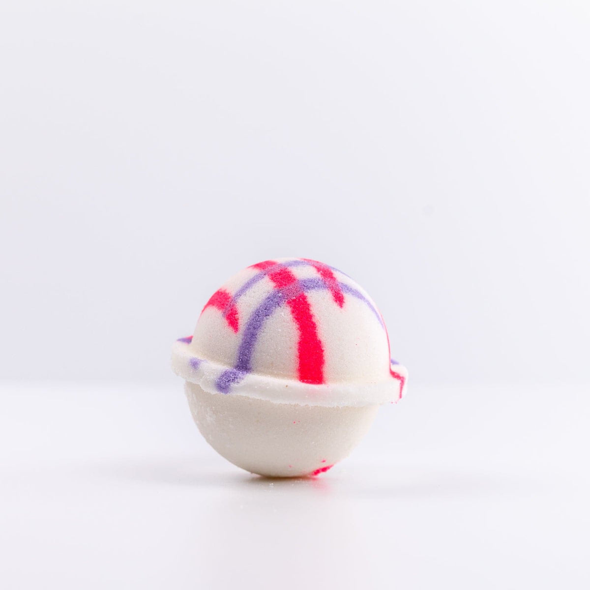 Upright Unicorn Bath Bomb with a pink and purple design
